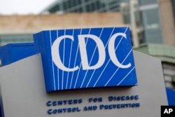 FILE - Centers for Disease Control and Prevention is shown Sunday, March 15, 2020, in Atlanta. The CDC is working to confirm the diagnosis of Lassa fever in the death of an Iowa man who traveled to West Africa. 