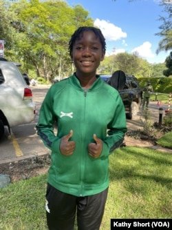 Lilian Mwenya, the youngest player on the Zambia national women's football team, is seen outside the Taj Pamodzi Hotel in Lusaka, Zambia in December. 20, 2024.