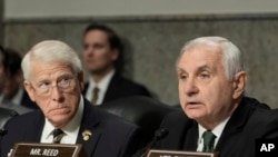 Senator Jack Reed, a Democrat, delivers opening remarks as Senator Roger Wicker, a Republican, delivers opening remarks during the Senate Armed Services Committee confirmation hearing for Pete Hegseth at the Capitol in Washington on January 14, 2025.